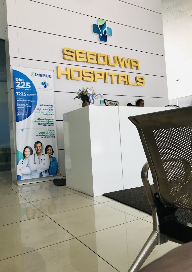 Reception desk and Seeduwa Hospitals wall signage